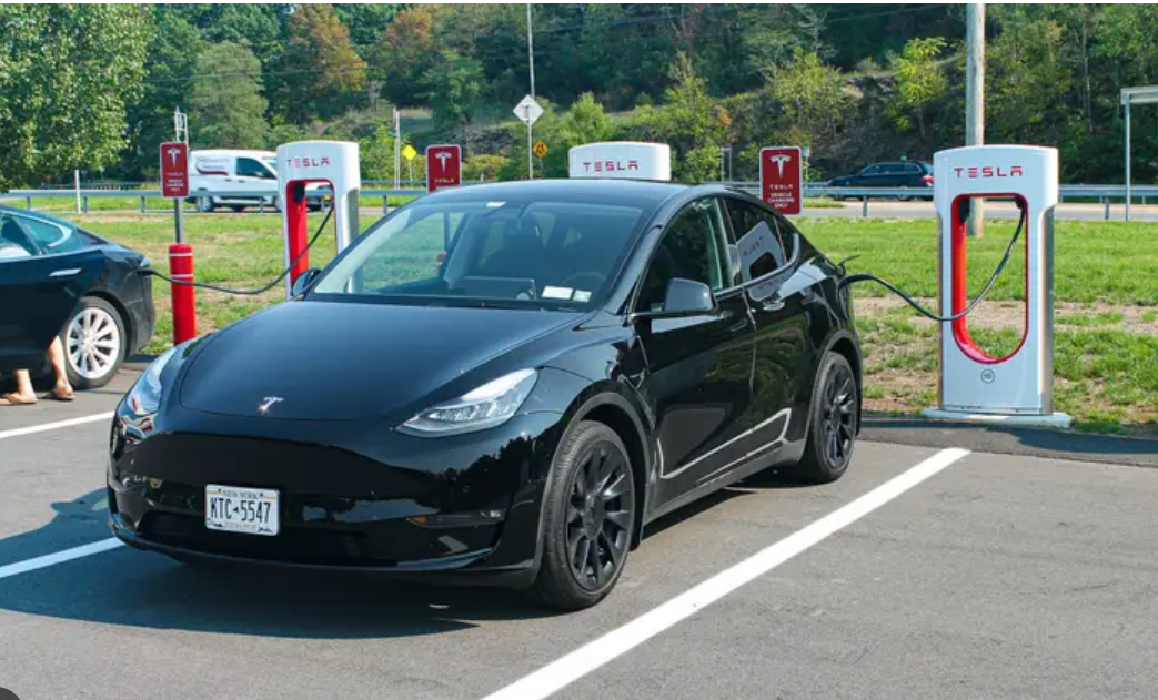 A Tesla vehicle on a suburban street